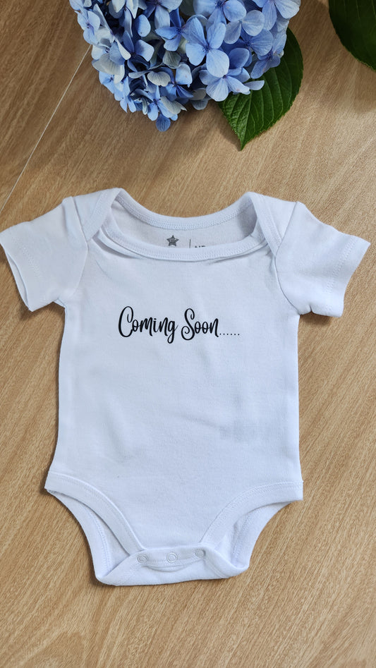 'Coming soon' baby onesie (short-sleeve)