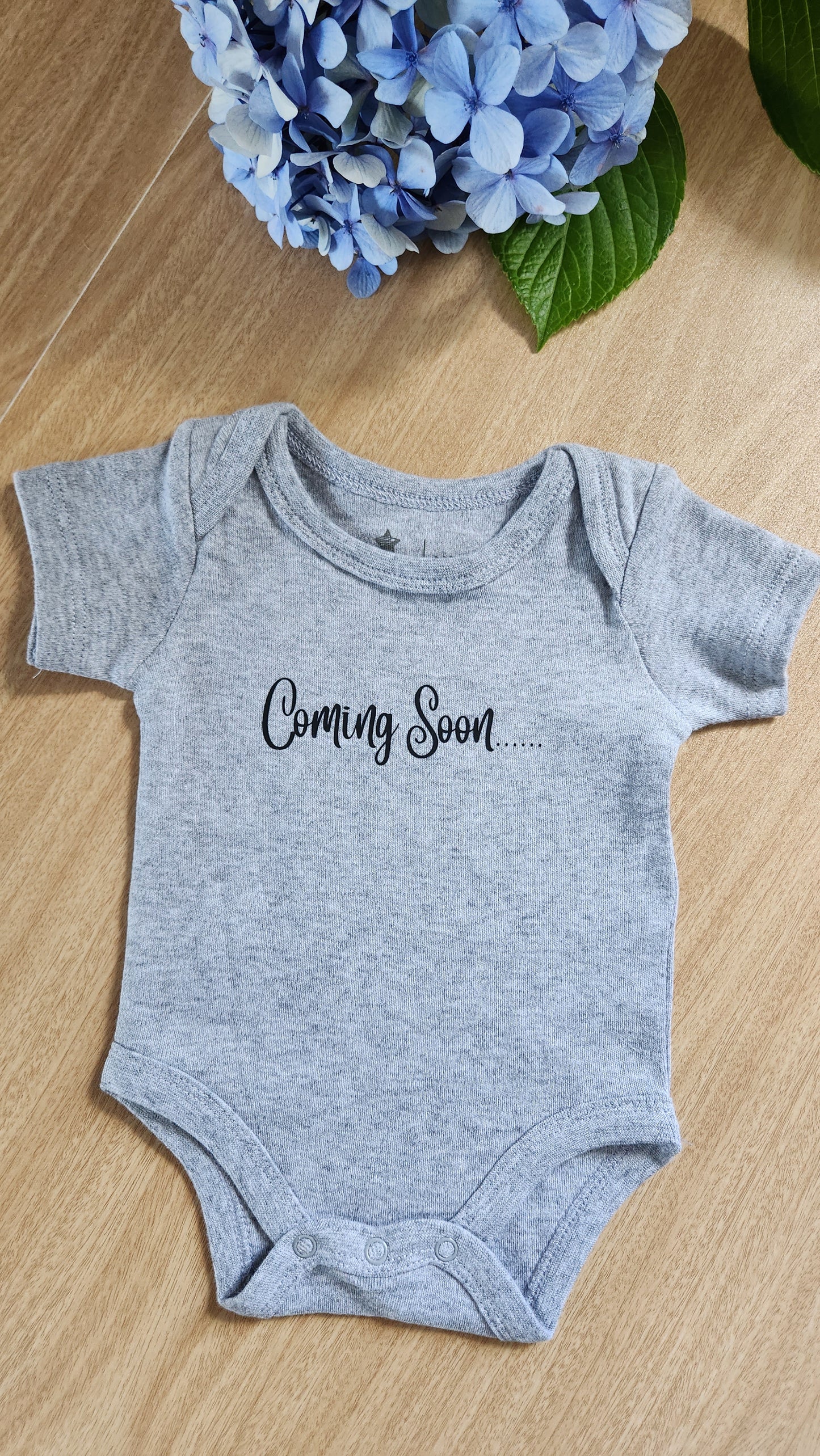 'Coming soon' baby onesie (short-sleeve)