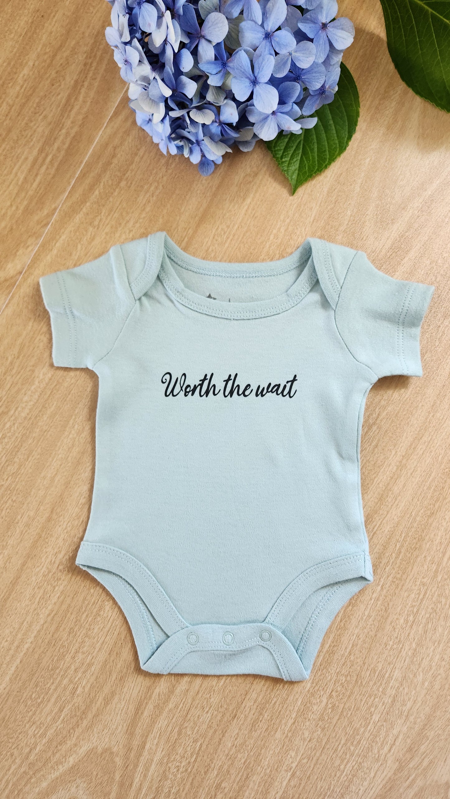 'Coming soon' baby onesie (short-sleeve)