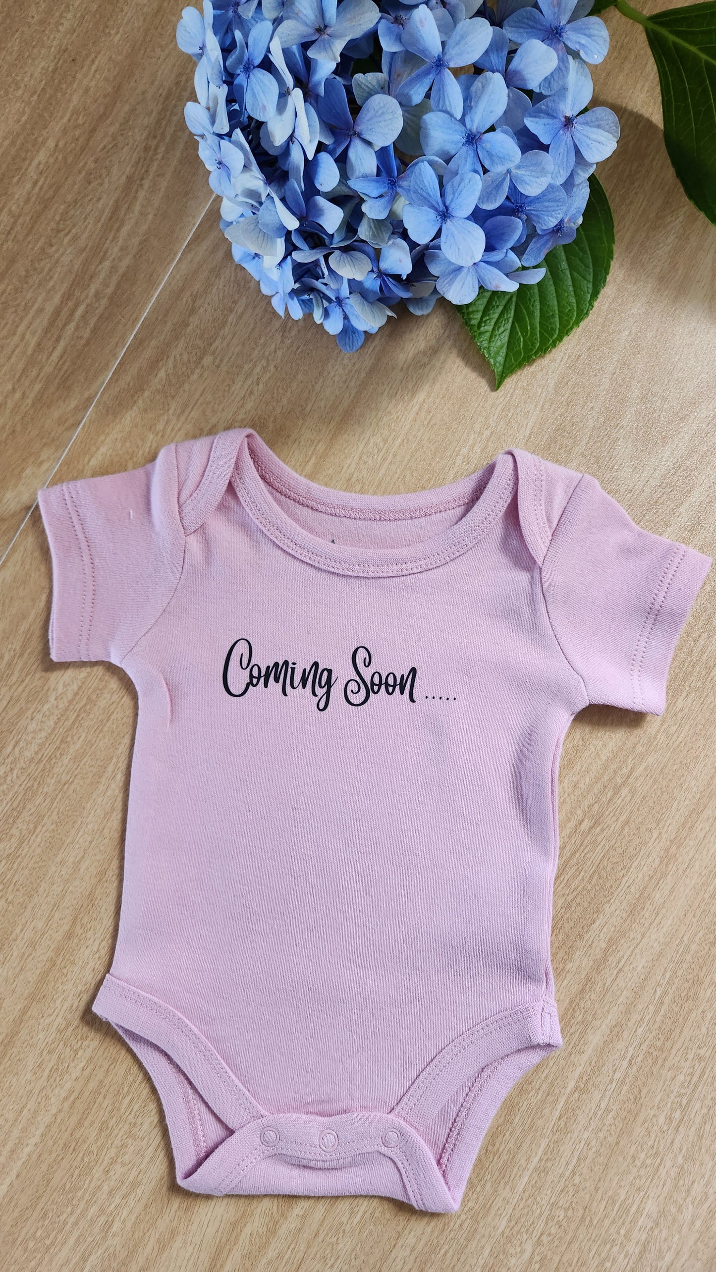 'Coming soon' baby onesie (short-sleeve)